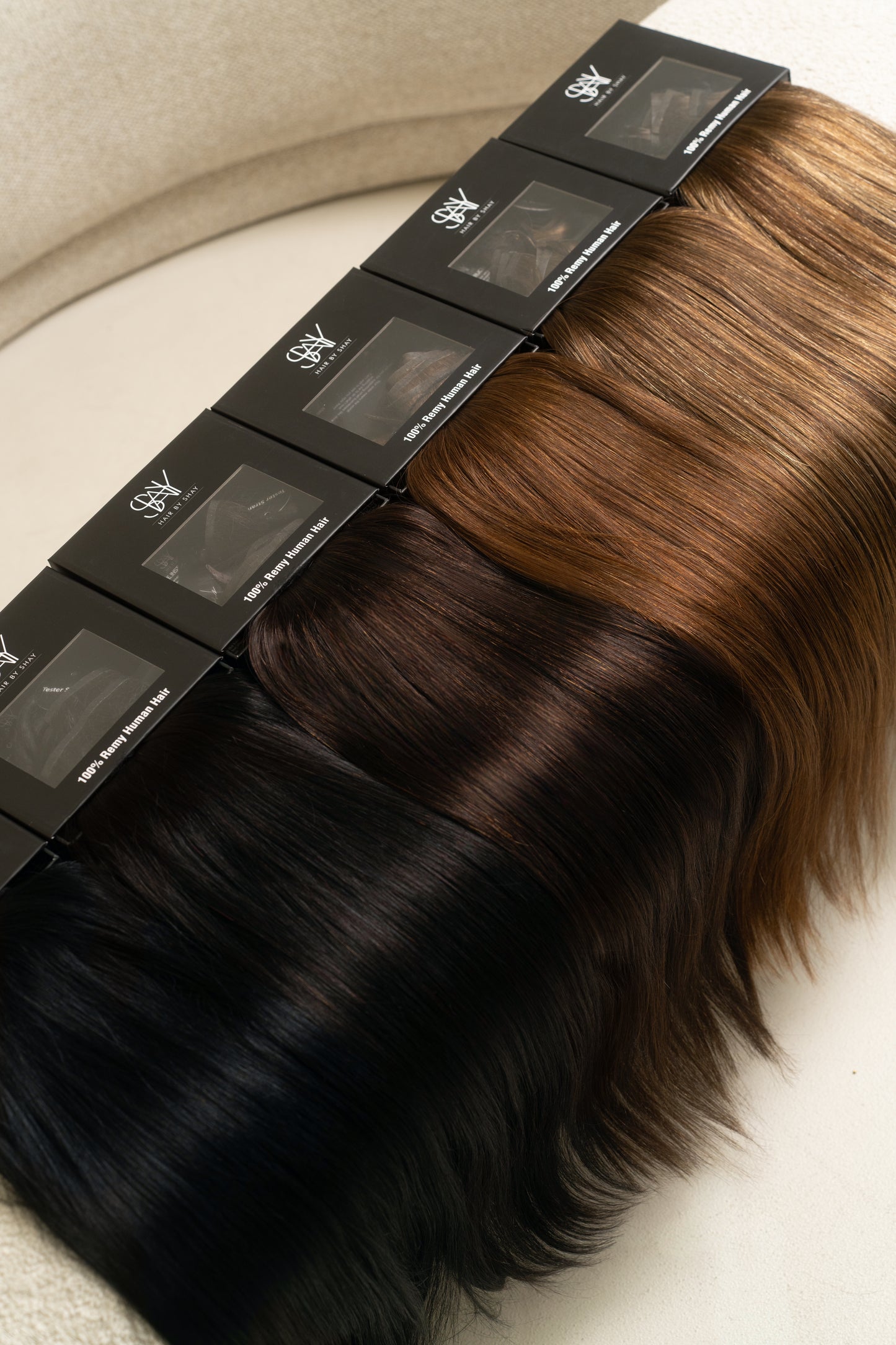 Hair extension shade comparison chart showing all colors