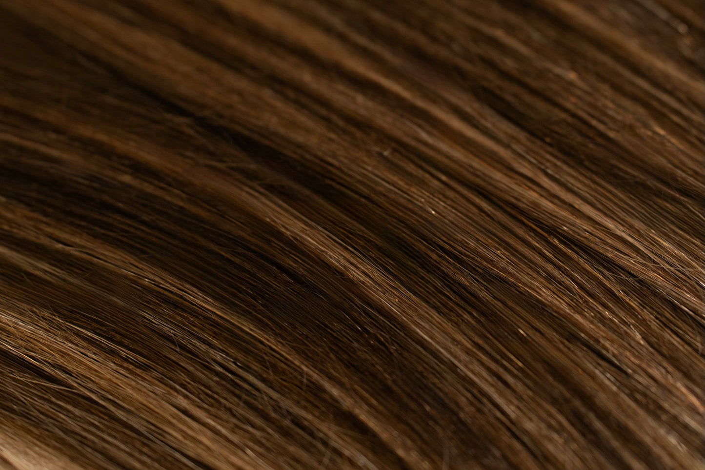 Dark balayage seamless hair extensions detail view