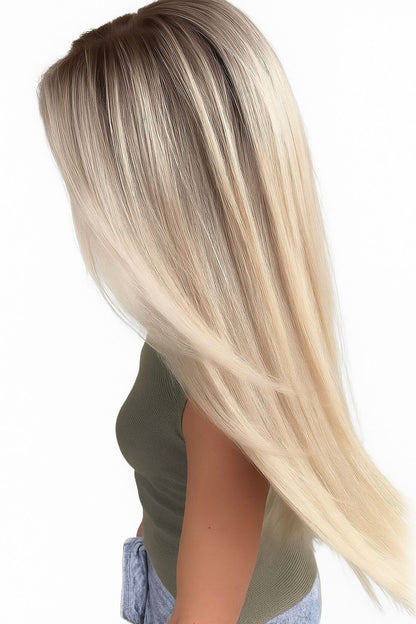 Woman wearing 22 inch blonde balayage hair extensions front view